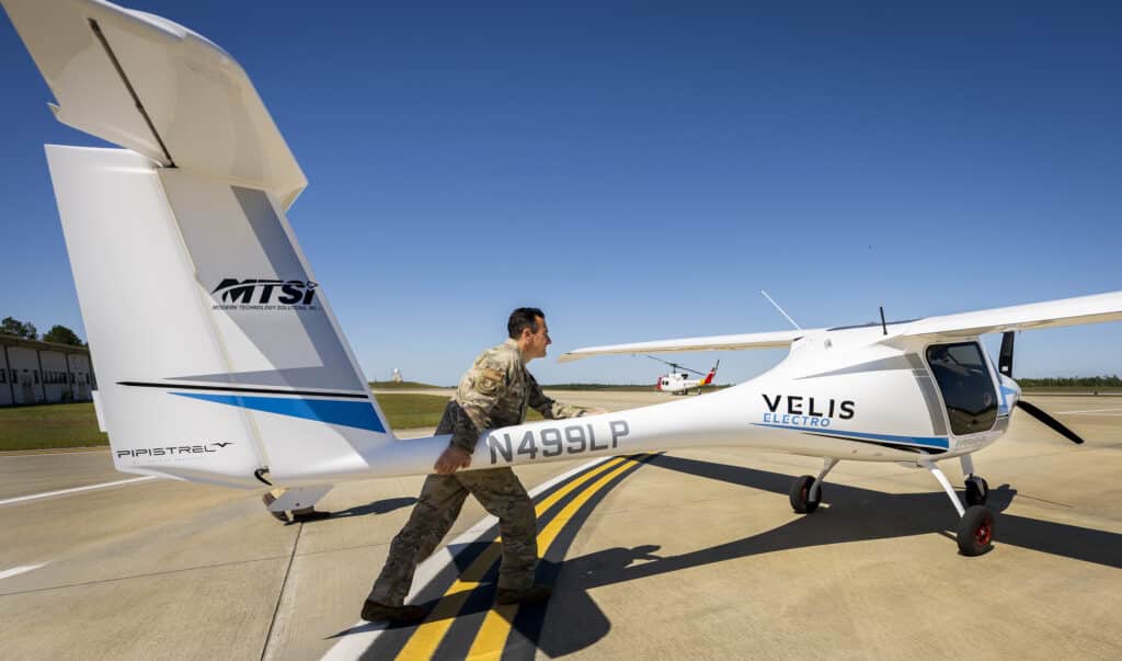 Brig. Gen. Jeffrey Geraghty, 96th Test Wing commander, pushes out the 1000-pound Pipistrel Velis Electro aircraft for a test flight April 22, 2024 at Eglin Air Force Base, Florida. Geraghty and other Eglin test pilots flew the 80-horsepower electric aircraft over a three-week period to provide qualitative evaluations to AFWERX toward electric aircraft usage for the Air Force.