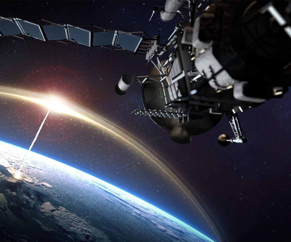 Spacecraft operating above Earth with orbital activity visualization.