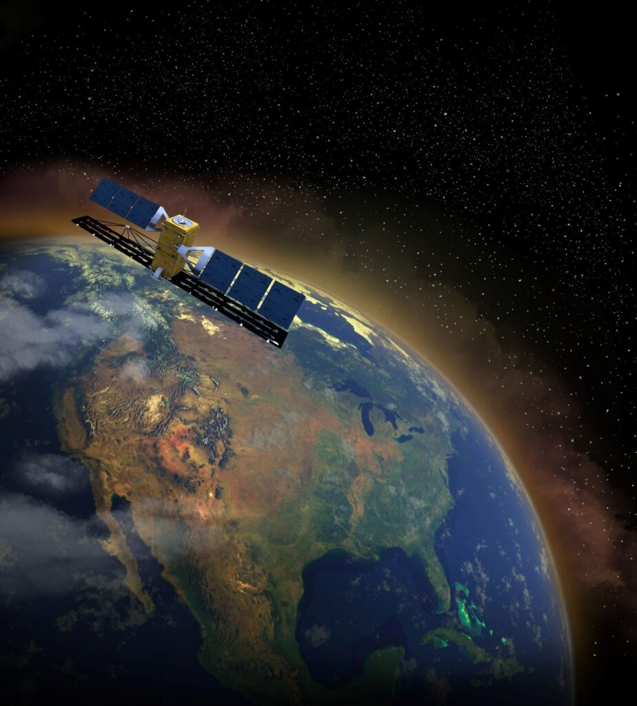 Satellite orbiting Earth above North America with visible atmosphere and space background.
